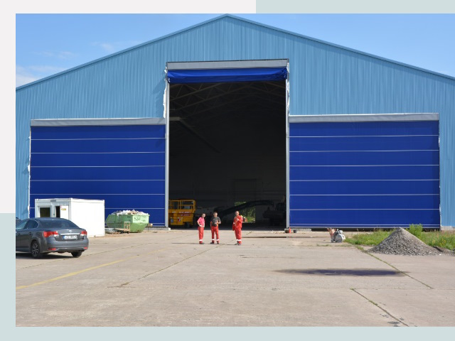 Ангарные ворота в Йошкар-Ола от СтальСтрой-Шкр по цене 614 руб.